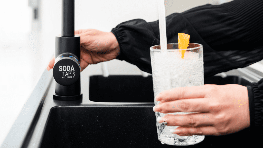Sparkling water coming from tap